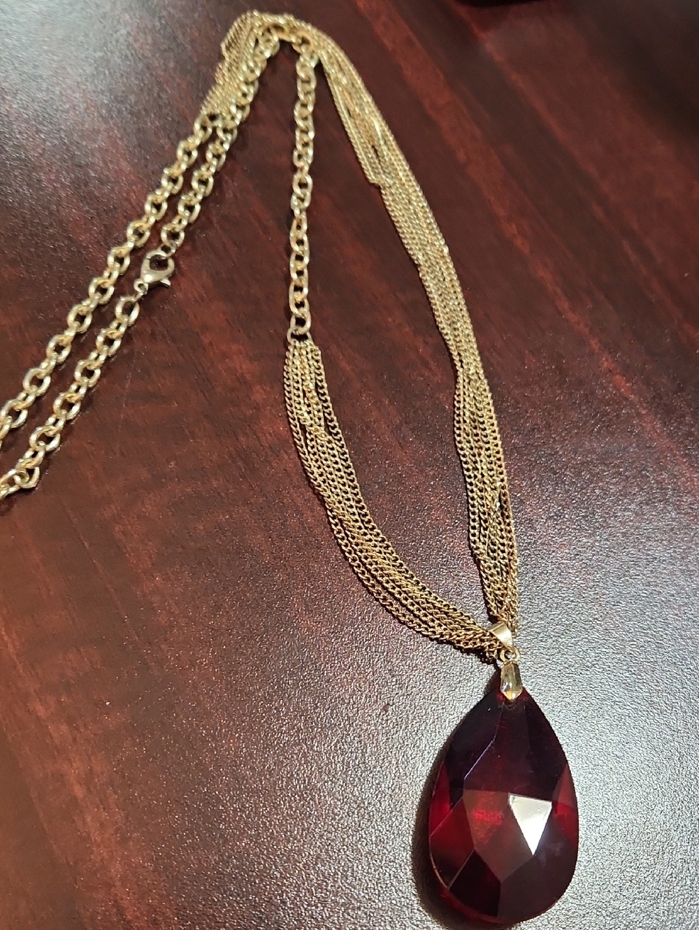Gold Multi-Chain Necklace with Deep Red Teardrop Pendant